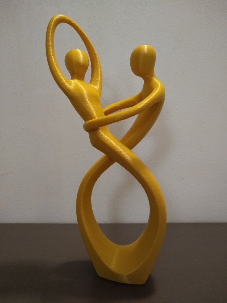 Figurine d'un couple de danseur doré
