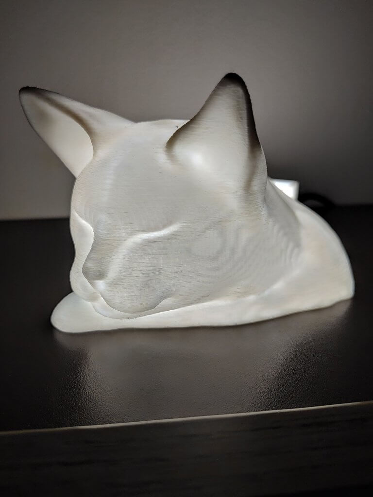 Lampe statuette d'une tête d'un Chat allongé